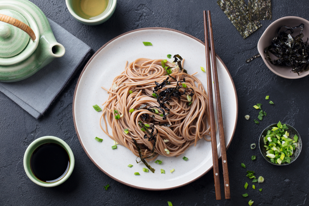 Soba,Noodles,With,Sauce,And,Garnishes.,Japanese,Food.,Top,View.