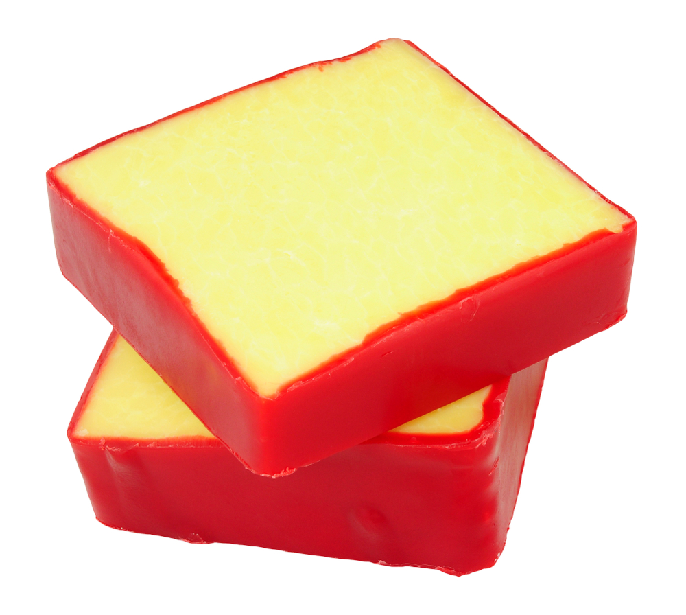 Monterey,Jack,Cheese,Squares,With,Red,Wax,Coating,Isolated,On
