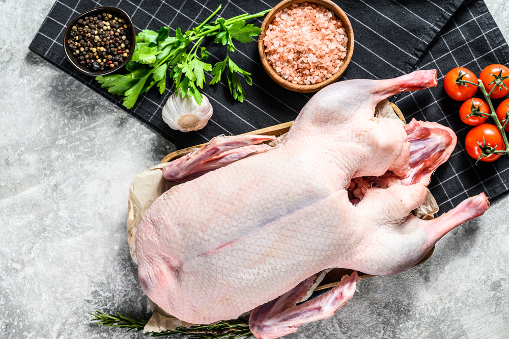 Whole,Raw,Goose.,Recipe,For,Cooking,With,Pink,Salt,,Garlic,