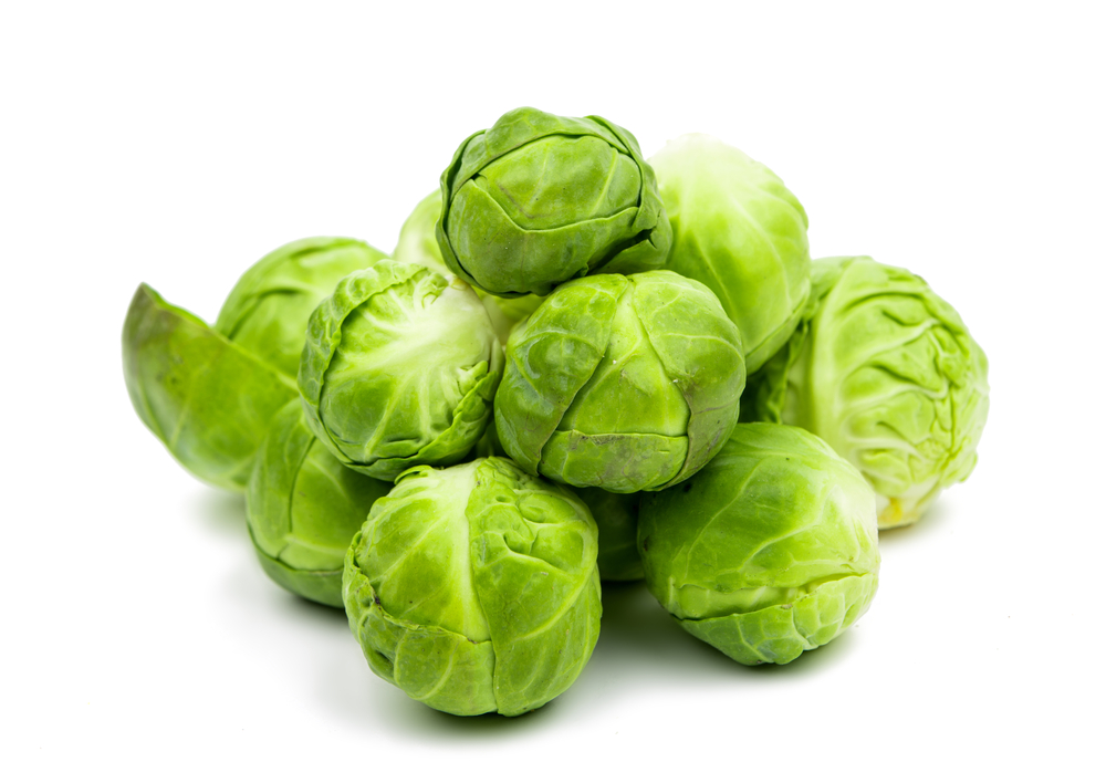 A,Pile,Of,Brussels,Sprouts,On,A,White,Background