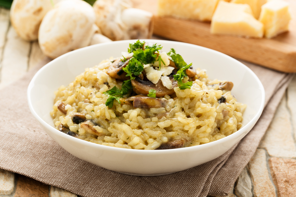 Risotto,With,Mushrooms,,Fresh,Herbs,And,Parmesan,Cheese.