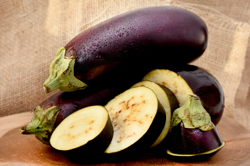 The,Eggplant,Vegetable,On,A,Wooden,Table,And,A,Rustic