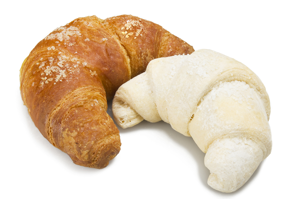 Frozen,And,Fresh,Croissants,Ready,To,Oven,On,The,White