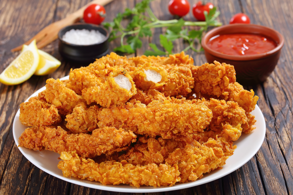 Close-up,Of,Delicious,Crispy,Fried,Chicken,Breast,Strips,On,White