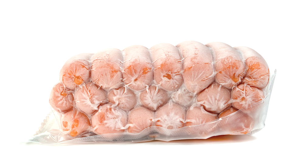 Closeup,Frozen,Sausage,In,Plastic,Bag,With,Ice,Crystals,Isolated