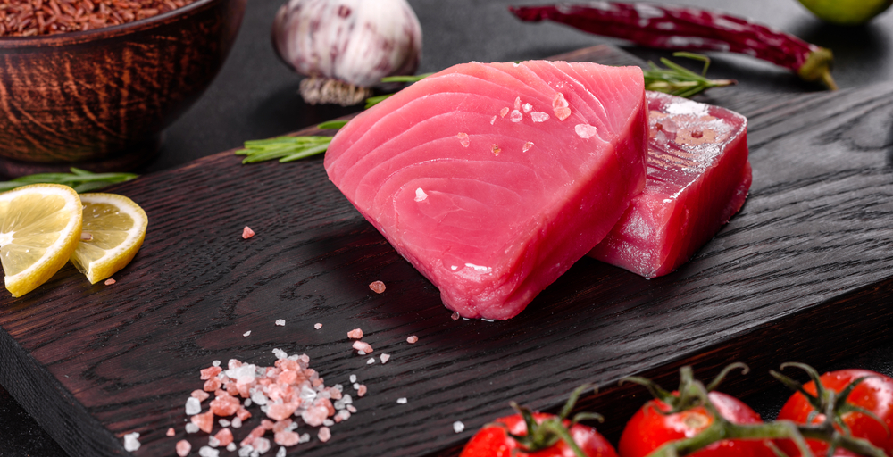 Fresh,Tuna,Fillet,Steaks,With,Spices,And,Herbs,On,A