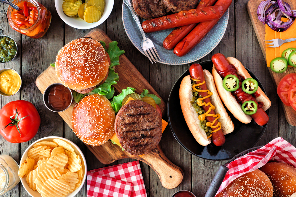Summer,Bbq,Food,Table,Scene,With,Hot,Dog,And,Hamburger