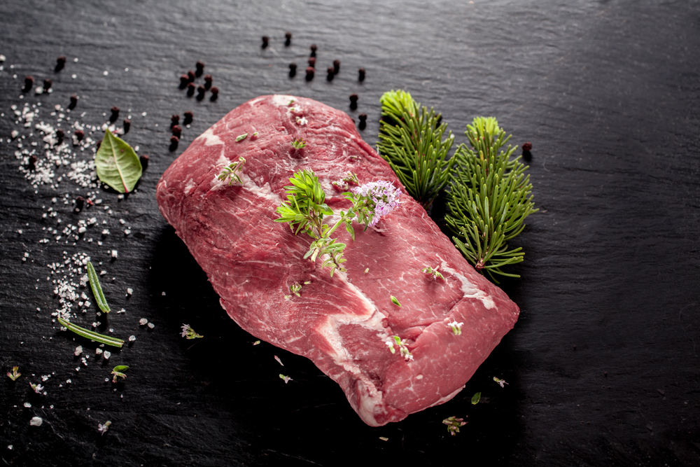 Slab,Of,Uncooked,Wild,Boar,Steak,For,Roasting,On,A