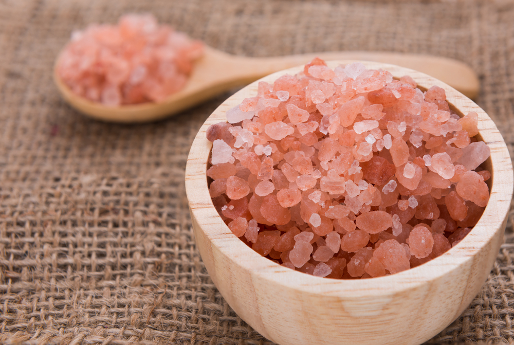 Himalayan,Raw,Salt,In,Glass,Bottle,On,Sack,Cloth,Background,spa