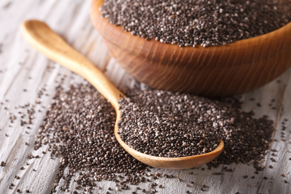 Healthy,Chia,Seeds,In,A,Wooden,Spoon,On,The,Table