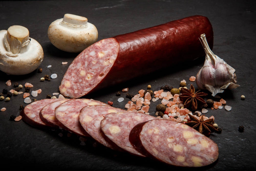 Delicatessen,Sliced,Cheddar,Summer,Sausage,With,Sliced,Pieces,Served,With