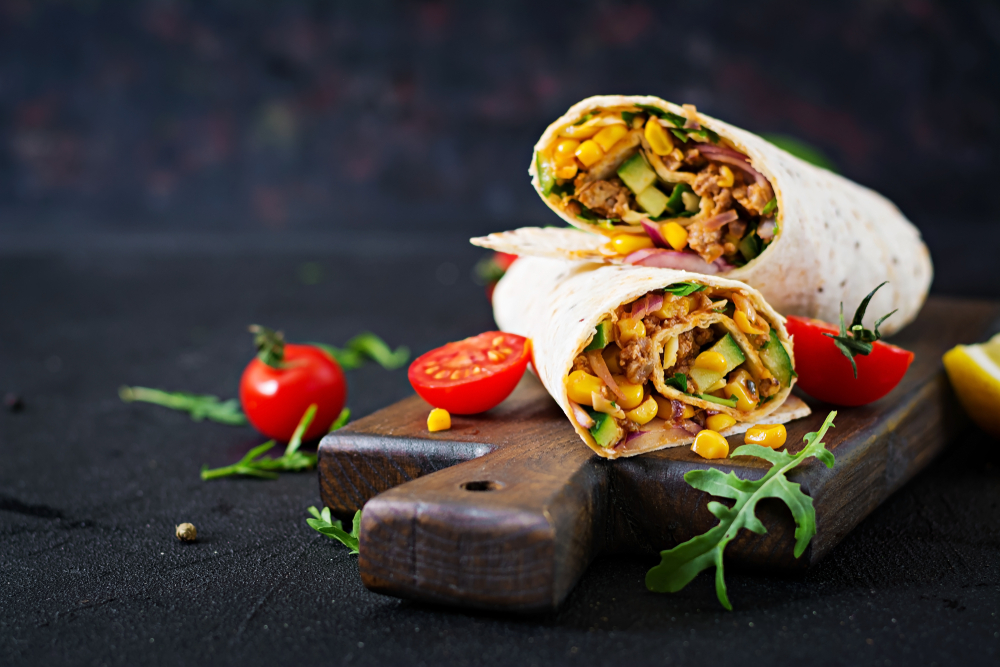 Burritos,Wraps,With,Beef,And,Vegetables,On,Black,Background.,Beef